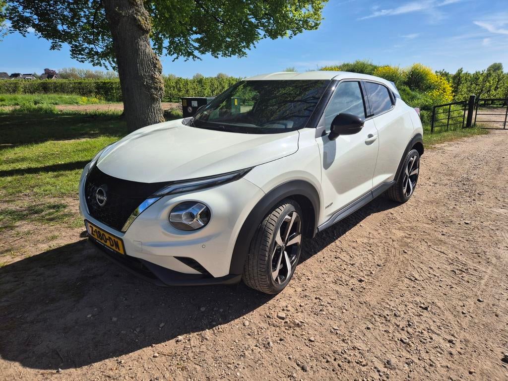Nissan Juke Hybrid 143pk 2023 Wit, Auto's, 1300 kg, 4 cilinders, 93 pk, SUV of Terreinwagen