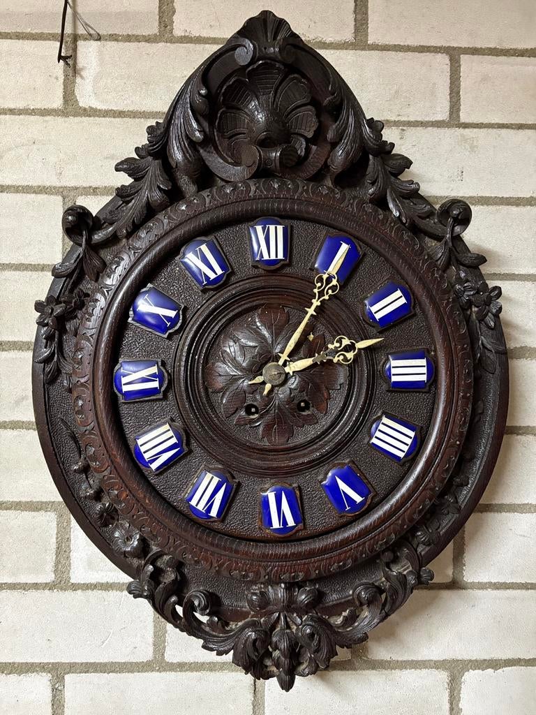 Houtsnijwerk klok en barometer, Ophalen