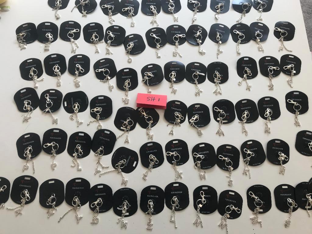 partij sleutelhangers, Ophalen of Verzenden, Nieuw, Overige kleuren, Overige materialen