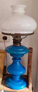 Blauwe glazen lamp, Ophalen
