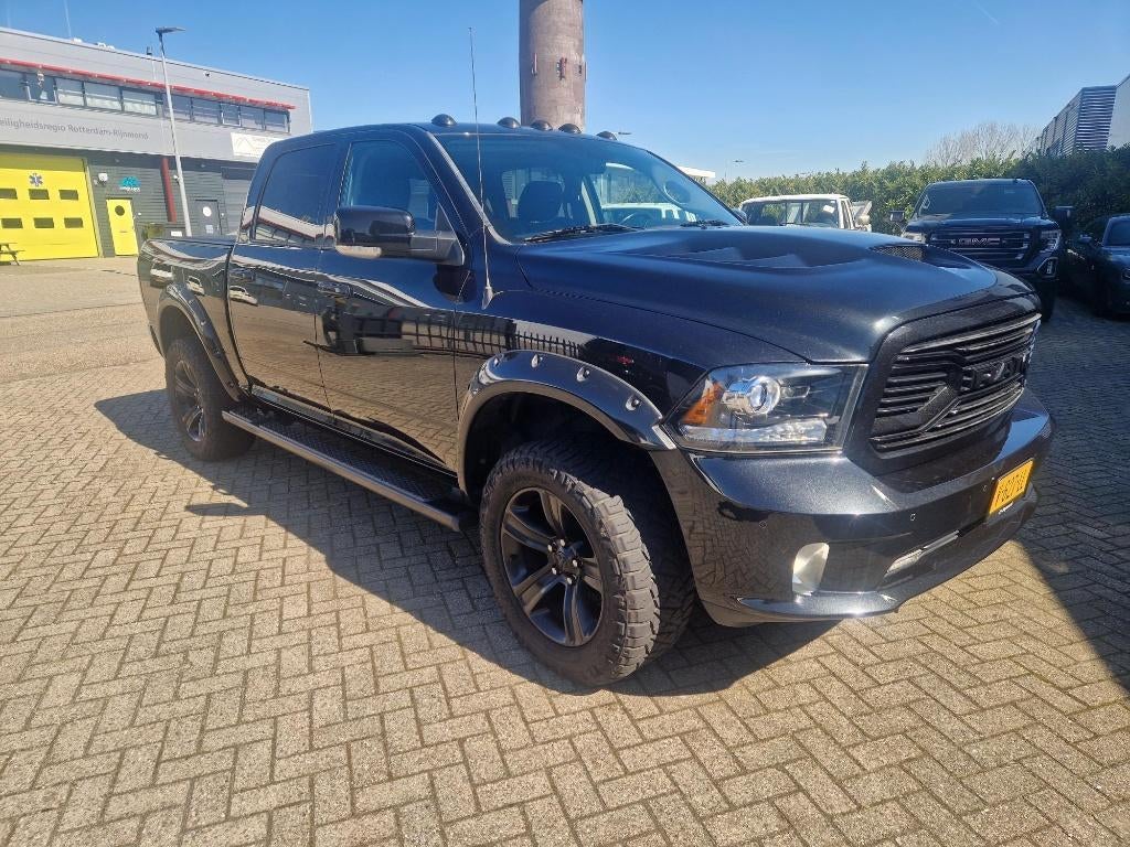 Dodge RAM 1500 SPORT , full options, €27.850 ex BTW, Automaat, 5654 cc, Met garantie (alle), Zwart