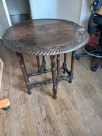 Eikenhouten klaptafel met houtsnijwerk, Ophalen