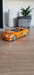 Toyota supra mk4 1:24 modelauto., Hobby en Vrije tijd, Modelauto's | 1:24, Ophalen of Verzenden, Zo goed als nieuw