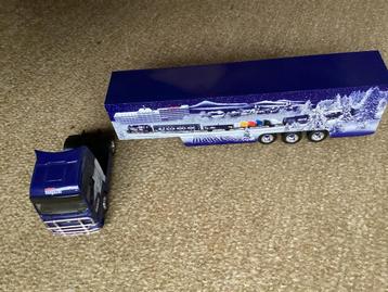 Herpa truck met drie assige oplegger met speciale opdruk MM beschikbaar voor biedingen