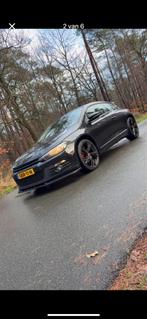 Volkswagen Scirocco 1.4 TSI 90KW BMT 2010 Zwart, Auto's, Voorwielaandrijving, Stof, 4 cilinders, 4 stoelen