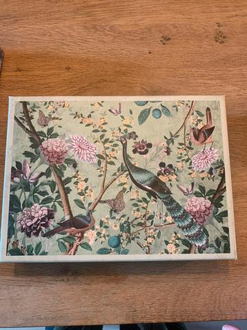 Legpuzzel met bloemen en vogels beschikbaar voor biedingen