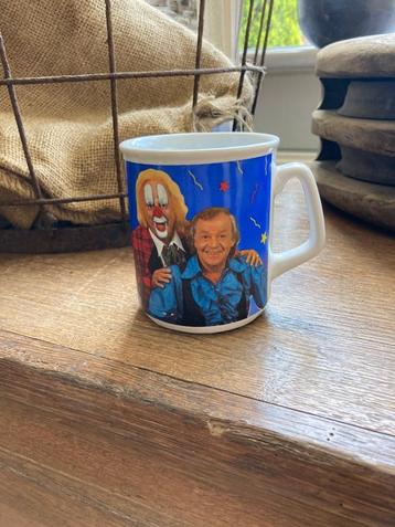 Bassie en Adriaan mok beschikbaar voor biedingen
