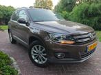 Volkswagen Tiguan 1.4 TSI 90KW BMT 2012 Bruin, Voorwielaandrijving, 15 km/l, 74 €/maand, 4 cilinders