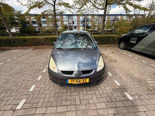 Mitsubishi Colt 1.1 2007 Grijs, Auto's, Mitsubishi, Particulier, Colt, Airbags, Airconditioning, Centrale vergrendeling, Metallic lak