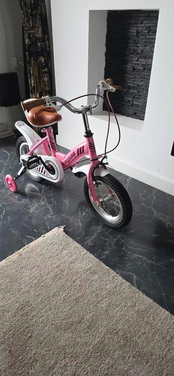 Roze Kangouroly kinderfiets met zijwieltjes beschikbaar voor biedingen