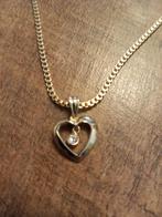 goud kleurige ketting met een hanger, Ophalen of Verzenden, Zo goed als nieuw, Goud, Overige materialen