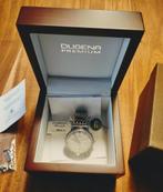 Dugena Festa Kalender automaat, nieuwstaat!, Overige merken, Staal, Staal, Polshorloge