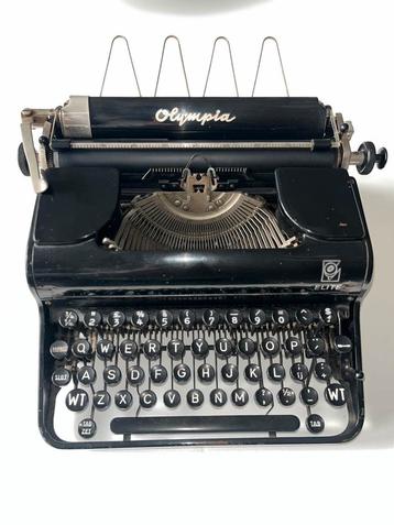 Vintage typemachine Olympia Elite  beschikbaar voor biedingen