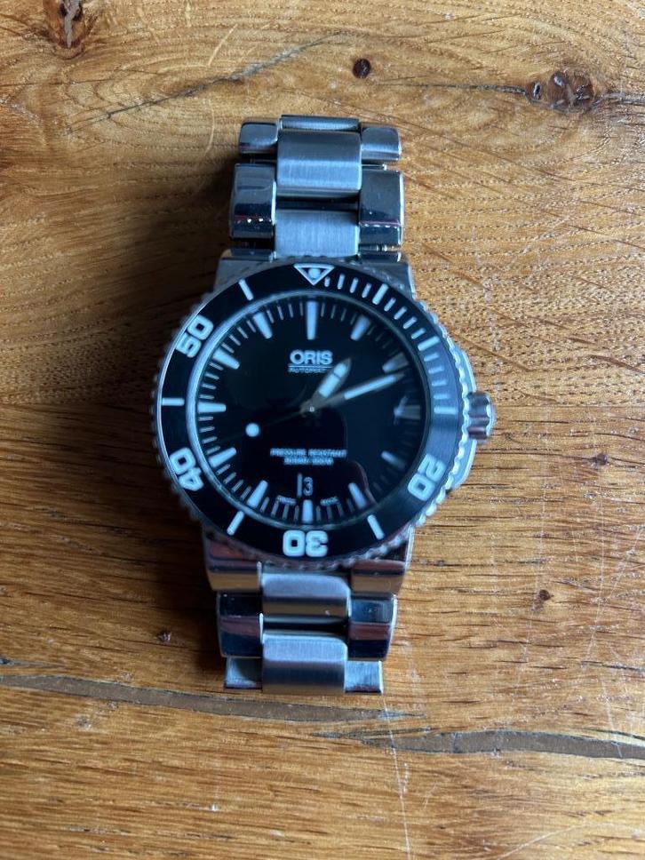 Oris Aquis Date, Sieraden, Tassen en Uiterlijk, Horloges | Heren, Gebruikt, Polshorloge, Overige merken, Staal, Staal, Ophalen