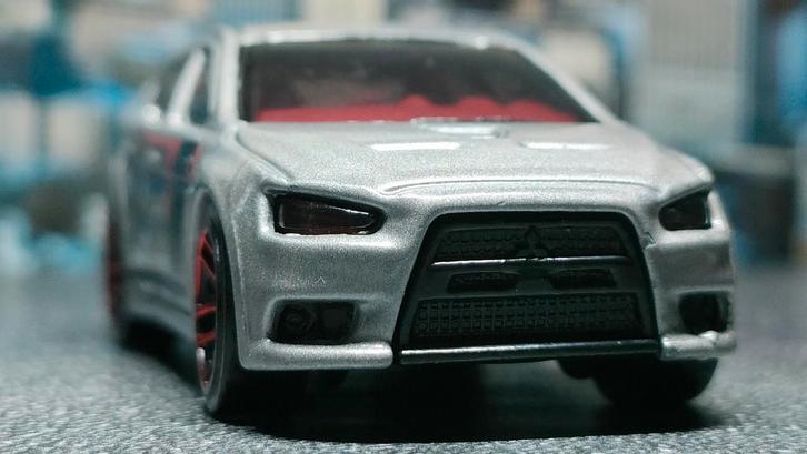 2008 Mitsubishi Lancer Evo grijs Hot Wheels, Hobby en Vrije tijd, Modelauto's | Overige schalen, Nieuw, Ophalen of Verzenden