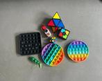 Setje popits en rubik cubes, Verzenden, Zo goed als nieuw