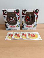 2 Loes van Delft Duvel glazen. Nieuw in doos. + Bierviltjes, Ophalen of Verzenden, Nieuw, Glas of Glazen, Duvel