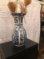 Antieke delfsblauwe vaas, Ophalen