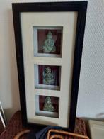 Fotolijst met kleine Boeddha's, Ophalen