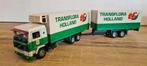 Tekno Volvo F12 Transflora van Spronsen, Hobby en Vrije tijd, Modelauto's | 1:50, Ophalen of Verzenden, Zo goed als nieuw, Bus of Vrachtwagen