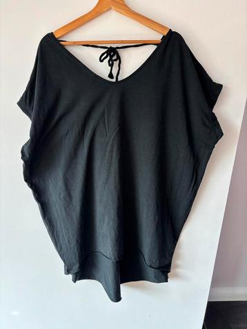 Shirt maat 48/50 beschikbaar voor biedingen