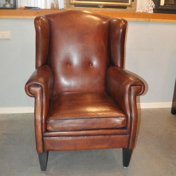 Grote schapenlederen oorfauteuil, Antiek en Kunst, Antiek | Meubels | Stoelen en Banken, Ophalen of Verzenden