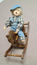 Hobbelpaard met pop, Ophalen