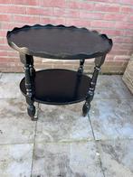 Zwarte theetafel met twee bladen en wieltjes, Huis en Inrichting, Gebruikt, 55 tot 75 cm, Ovaal, Hout