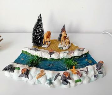 Kerstfiguur herten langs rivier voor Kerstdorp beschikbaar voor biedingen