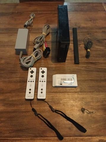 Zwarte Nintendo Wii incl 18 spellen 2 controllers en HDMI beschikbaar voor biedingen