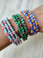 Vrolijke armbandjes, Ophalen of Verzenden, Zo goed als nieuw, Overige kleuren, Overige materialen