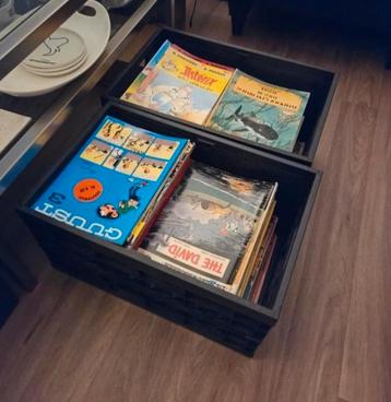 Twee kratten vol met stripboeken, ongeveer 250 stuks beschikbaar voor biedingen