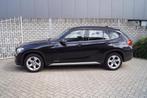 BMW X1 SDrive20i Executive Clima Cruise Xenon 4x Elektrische, Auto's, BMW, X1, 4 cilinders, Zwart, Bedrijf