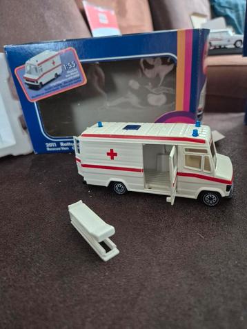 Siku ambulance met brancard  beschikbaar voor biedingen