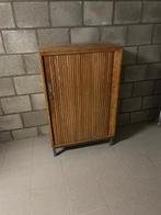 Oude schoolkast met roldeur, Ophalen