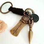 Handgemaakte lederen sleutelhanger Pixiu & Phurba, Ophalen