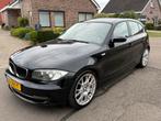Te Koop BMW 1-Serie 1.6 116I 2007 - Lage km - Nw apk, Auto's, 1596 cc, Zwart, 4 cilinders, 635 kg