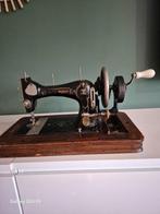 antieke naaimachine, Ophalen