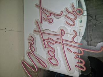 Neon sign roze " you cant sit with us "  beschikbaar voor biedingen