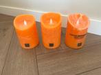 Ptmd ledkaars oranje, Huis en Inrichting, Woonaccessoires | Kandelaars en Kaarsen, Ophalen, Zo goed als nieuw, Overige materialen