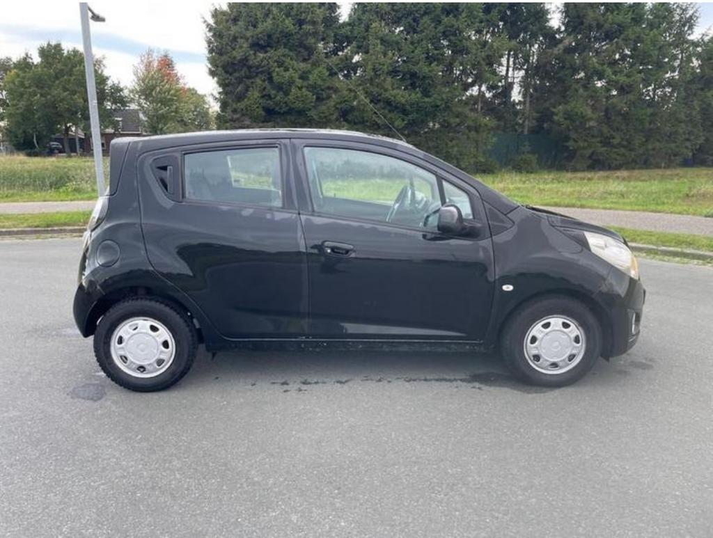 Chevrolet Spark 1.0 Bifuel 2012 Zwart, Auto's, 15 km/l, 37 €/maand, 4 cilinders, Zwart
