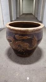 Antieke Chinese aardewerken eierpot, Ophalen