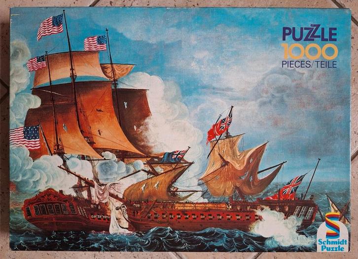 Schmidt Puzzle 1000 stukjes - Zeeslag Seeslacht, Hobby en Vrije tijd, Denksport en Puzzels, Zo goed als nieuw, Legpuzzel, 500 t/m 1500 stukjes