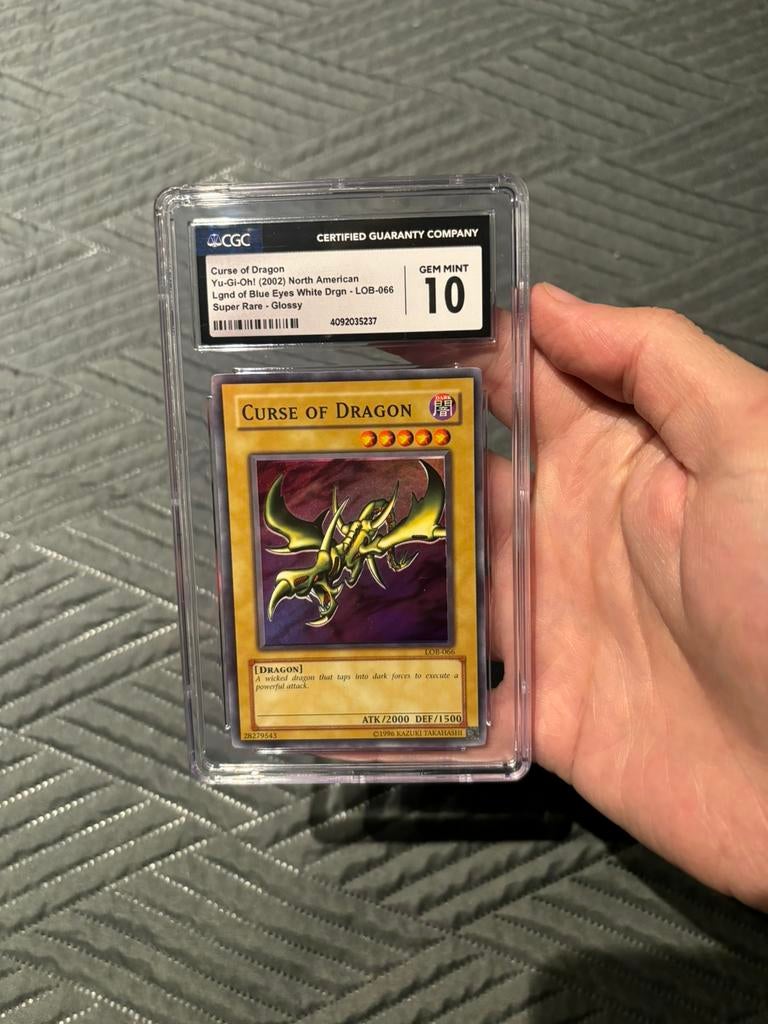 Yugioh 2002 CGC 10 gem mint curse of dragon, Hobby en Vrije tijd, Verzamelkaartspellen | Yu-gi-Oh!, Ophalen of Verzenden, Zo goed als nieuw