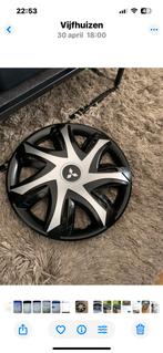 2 nieuwe Mitsubishi wieldoppen 14 inch., Auto diversen, Wieldoppen, Ophalen, Nieuw