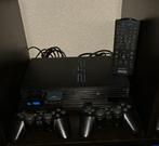 PlayStation 2 (PS2) • zwart • 2 controllers, Vanaf 12 jaar, Overige genres, Ophalen of Verzenden, Zo goed als nieuw