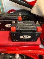 2x lithium accu met optimate druppel lader, Ophalen of Verzenden, Gebruikt