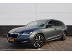 Skoda Octavia Combi 1.4 TSI iV PHEV Business Edition Plus St, Auto's, Automaat, Gebruikt, 4 cilinders, Parkeersensor