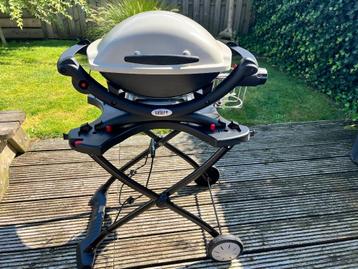 Weber Q1000 gas barbeque met standaard beschikbaar voor biedingen