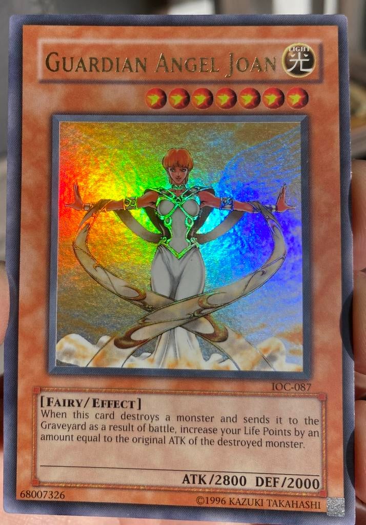 Yu-Gi-Oh! Guardian Angel Joan IOC Old US Print !, Ophalen of Verzenden, Gebruikt, Losse kaart, Foil